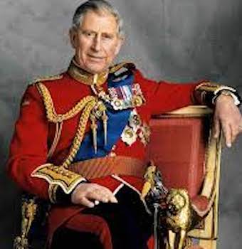 King Charles in uniform sitting on a chair